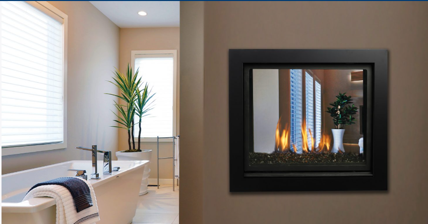 Kingsman MCVST42 see-through fireplace connecting two modern living spaces with natural light