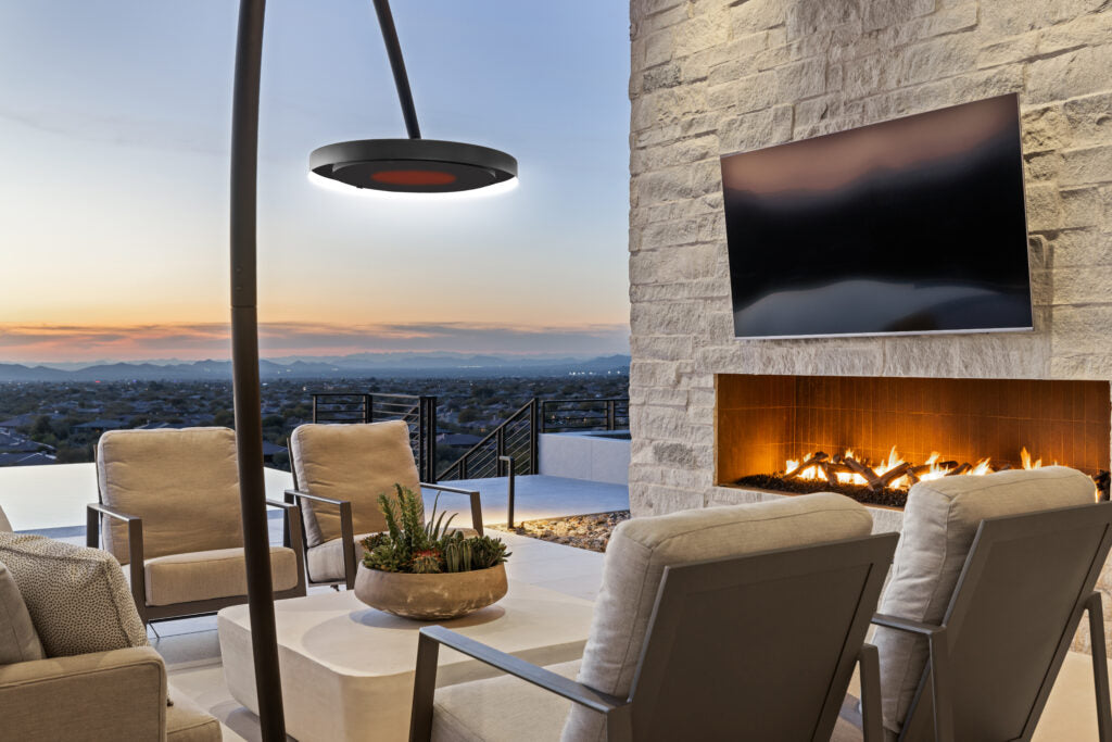 Bromic Eclipse heater installed beside open-air luxury patio at dusk