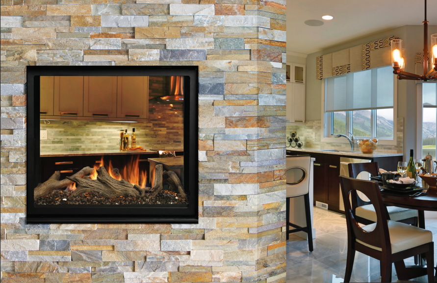 Kingsman MCVST42 see-through gas fireplace installed in a stone feature wall with visible flames on both sides