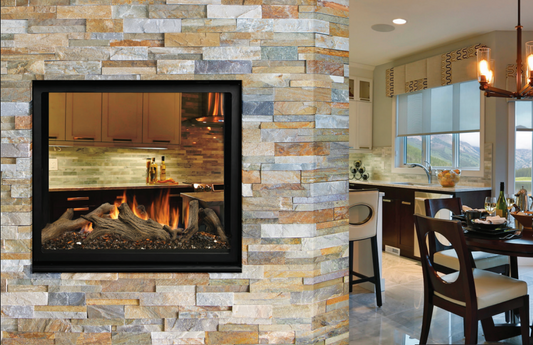 Kingsman MCVST42 see-through gas fireplace installed in a stone feature wall with visible flames on both sides