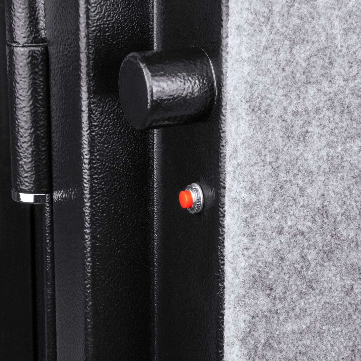 Close-up of Barska FV500 FireVault safe door showing solid steel locking bolt and interior carpeted panel with red indicator button