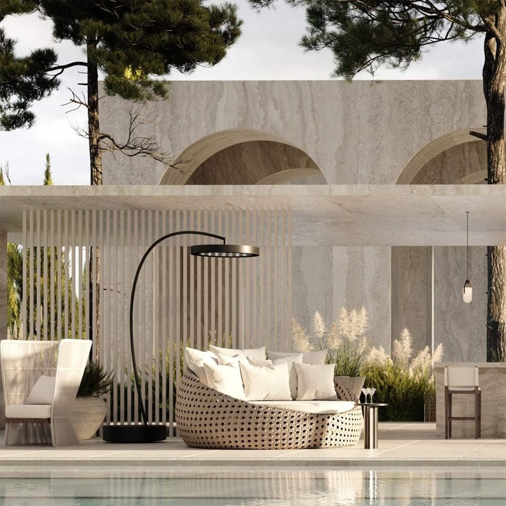 Bromic Eclipse heater beside outdoor lounge seating in a modern courtyard