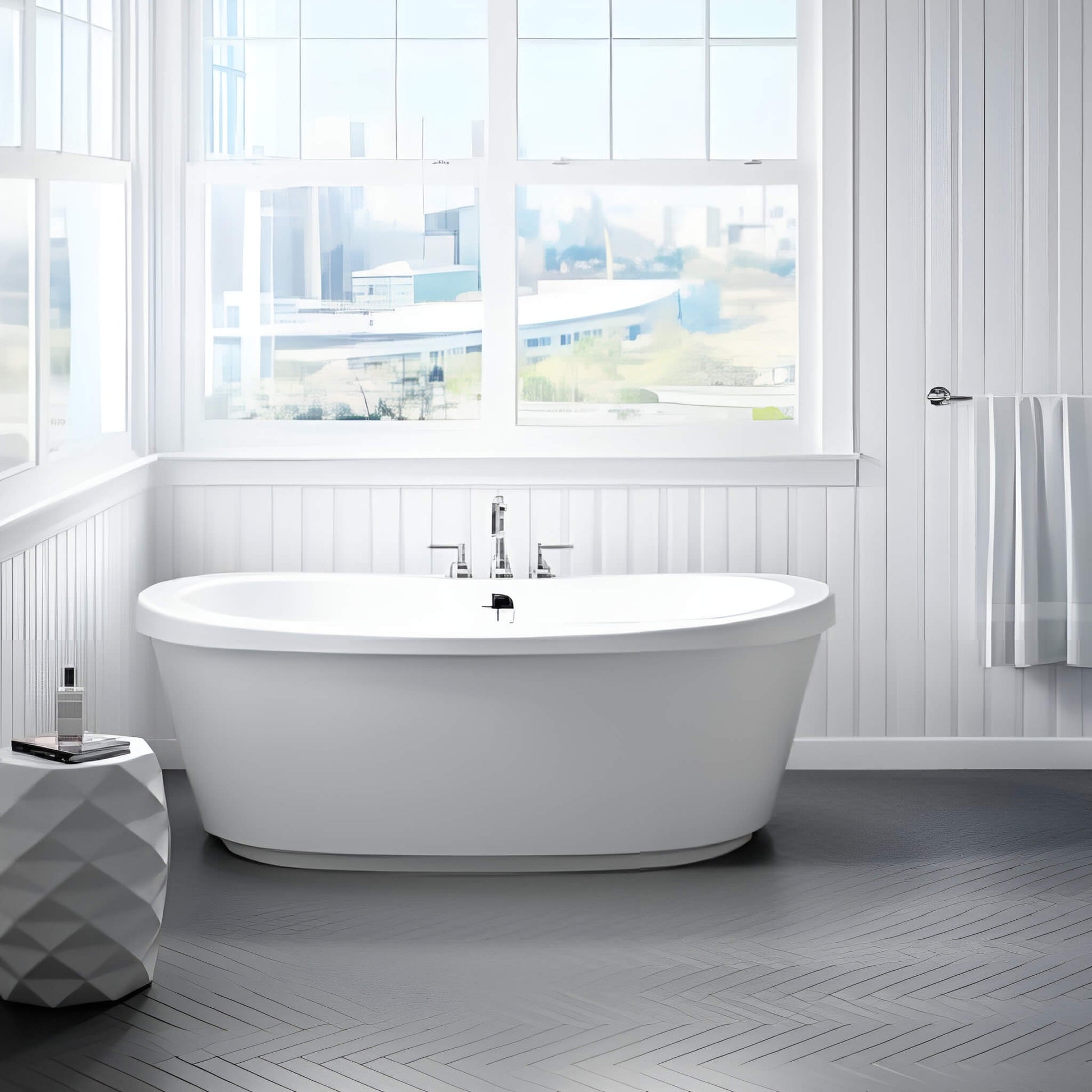 White Jacuzzi Bravo freestanding air tub in a bright modern bathroom with large windows