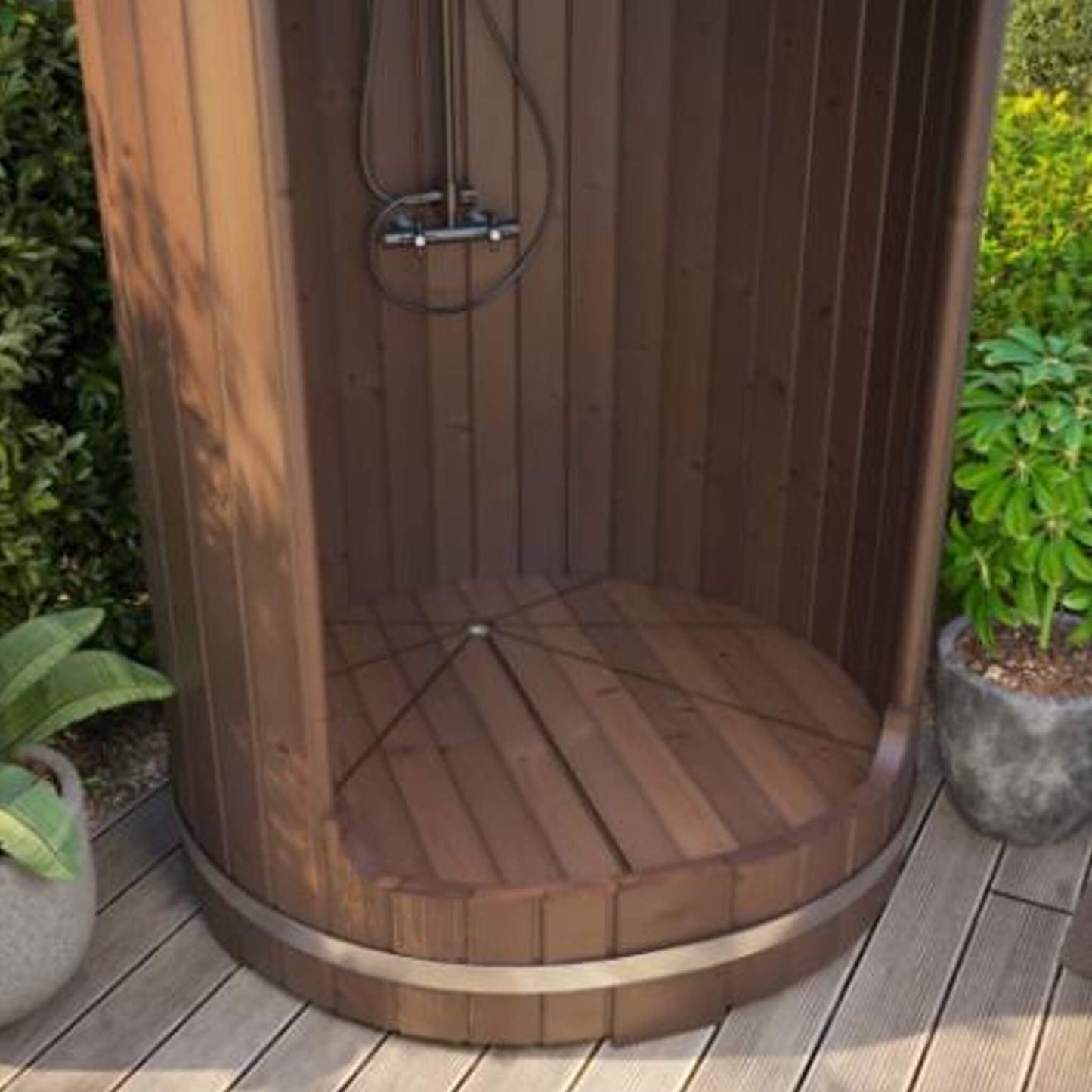 Interior floor and drain area of the SaunaLife Model R3 Barrel Shower, showing thermo spruce floor slats and pitched drainage design.