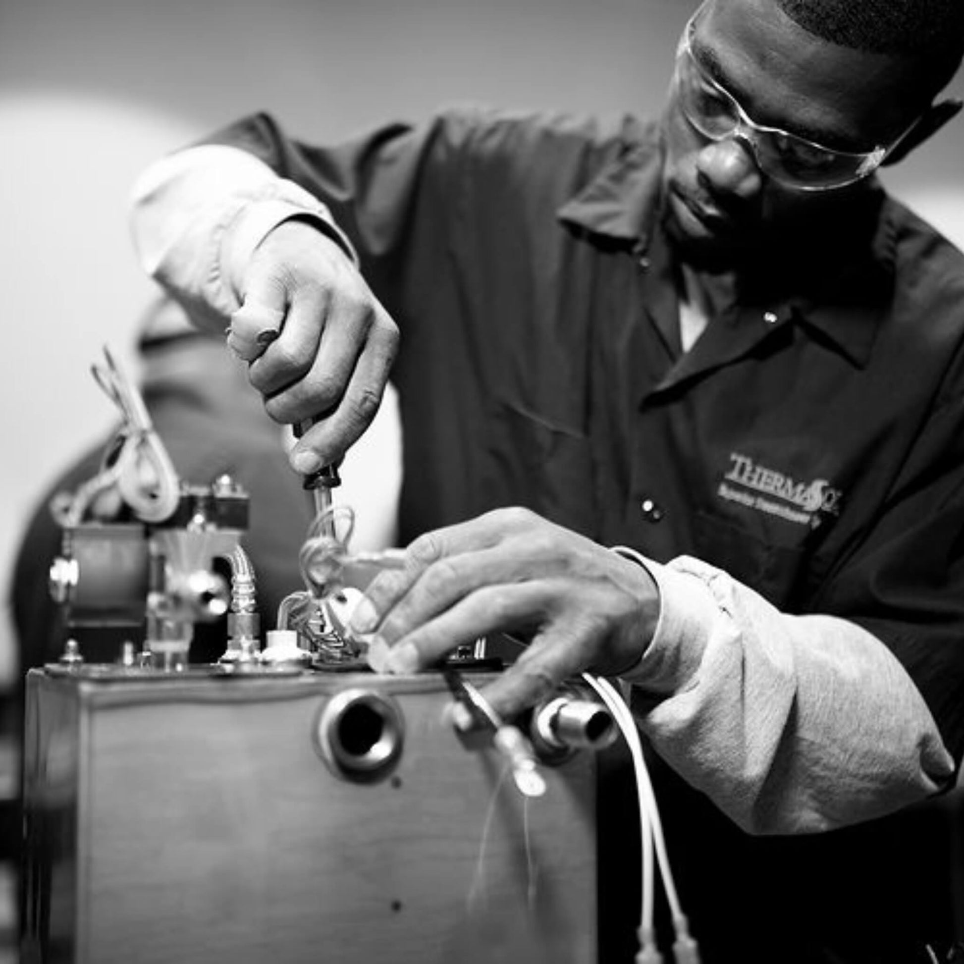 “ThermaSol technician servicing a steam generator during assembly.”