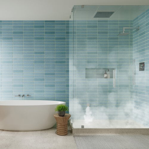 Modern bathroom showing ThermaSol steam shower in use, with visible floor-to-ceiling steam produced by SteamVection technology.