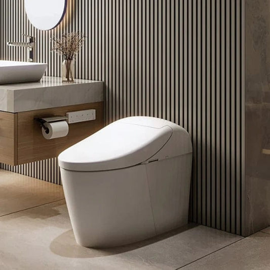“TOTO Washlet G5A integrated smart toilet in cotton white installed in a modern bathroom with wood vanity and vertical panel wall.”